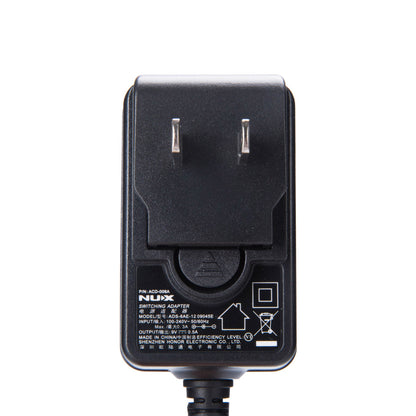 Nhãn thông số adapter NUX ACD-006A đầu vào 100-240V đầu ra 9V 0.5A